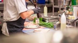 Restaurant chef cracking pepper