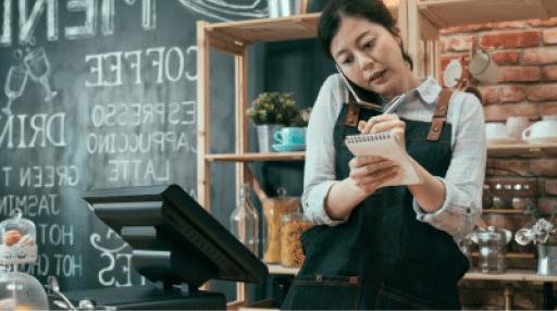 Women on phone taking restaurant order