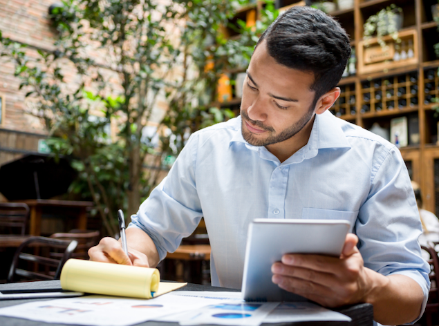 Man working diligently on accounting