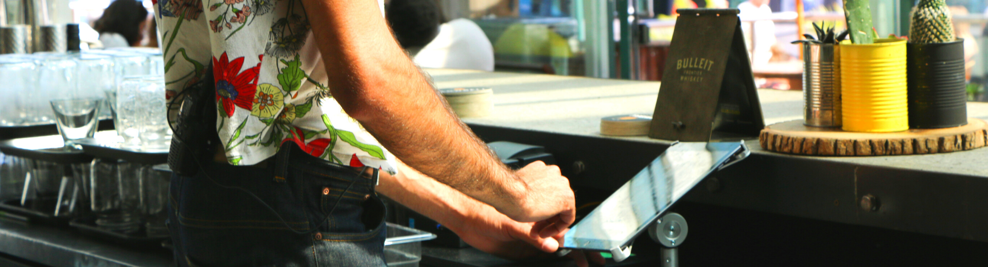 Restaurant employee at POS system