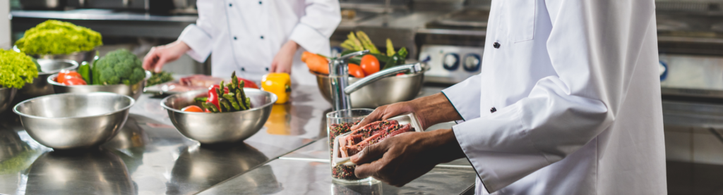 Chef preparing food in restaurant kitchen