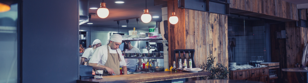Chefs working in restaurant kitchen