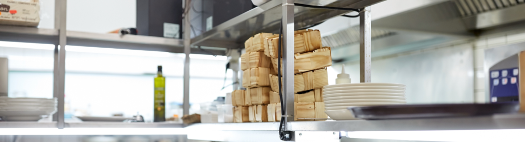 Restaurant Kitchen With To Go Food Boxes