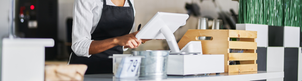 restaurant employee at cash register